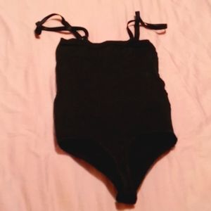 A body shaper, size small, color black.